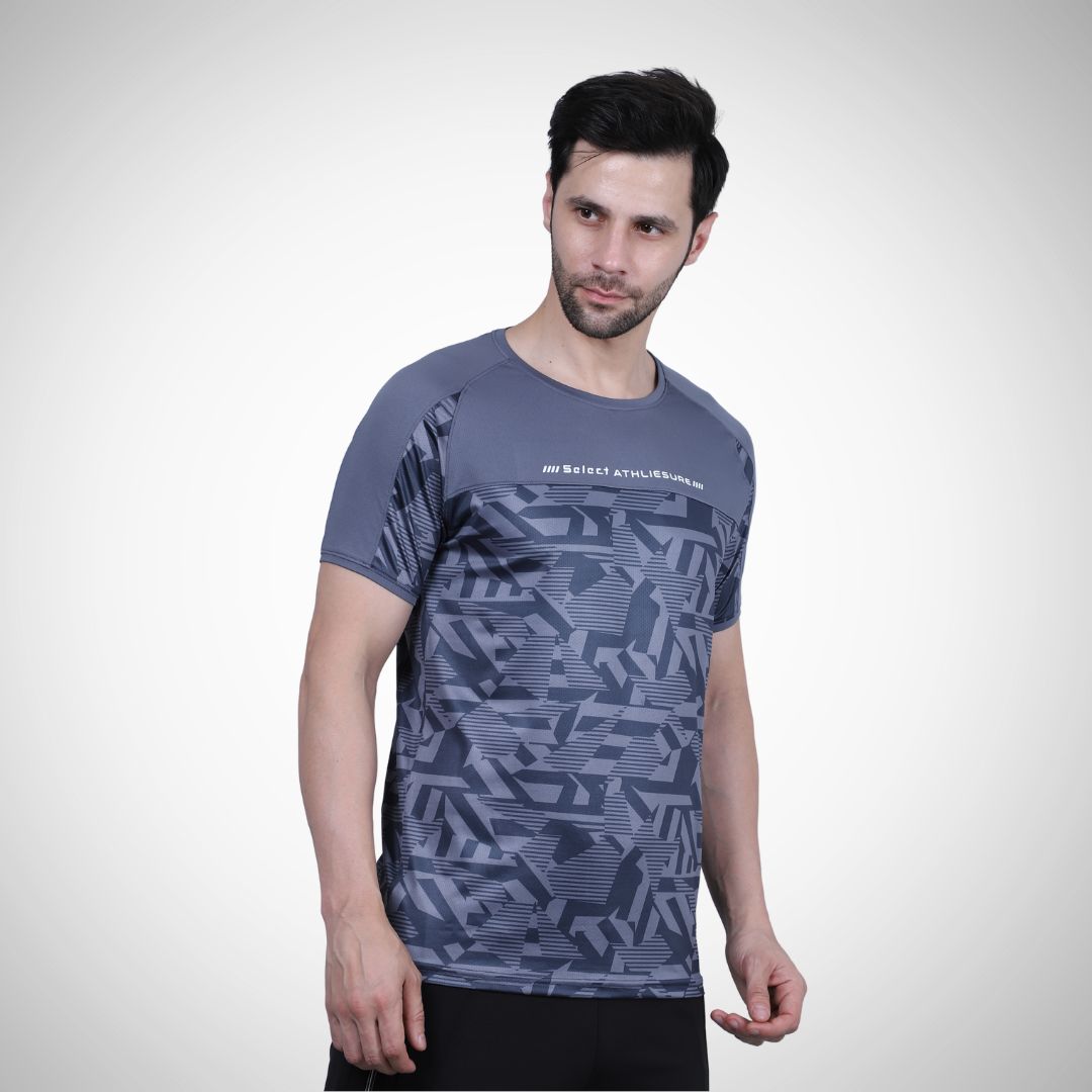 Man wearing a blue patterned t-shirt on a white background