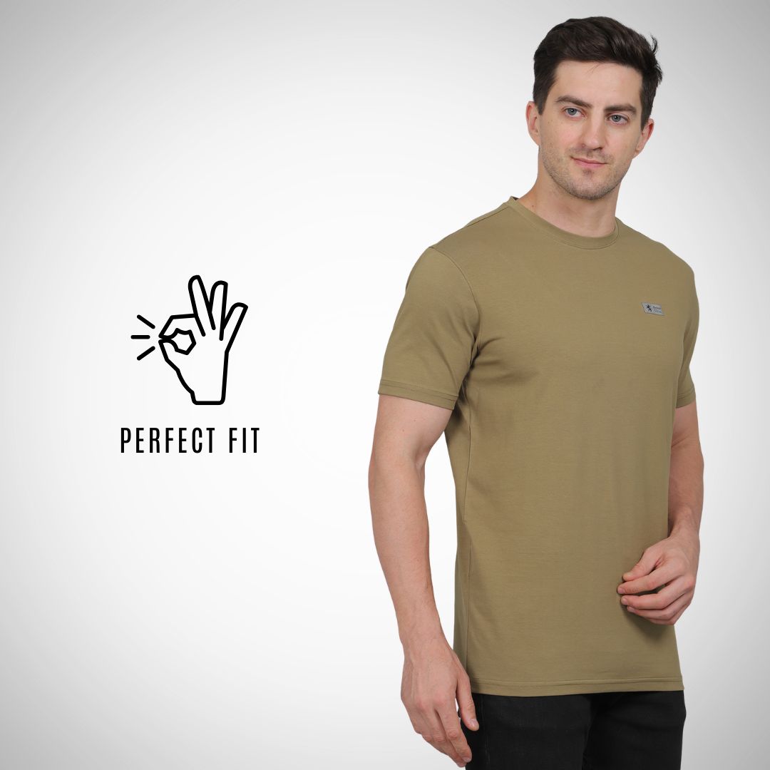Man wearing a green t-shirt with 'Perfect Fit' logo on a white background