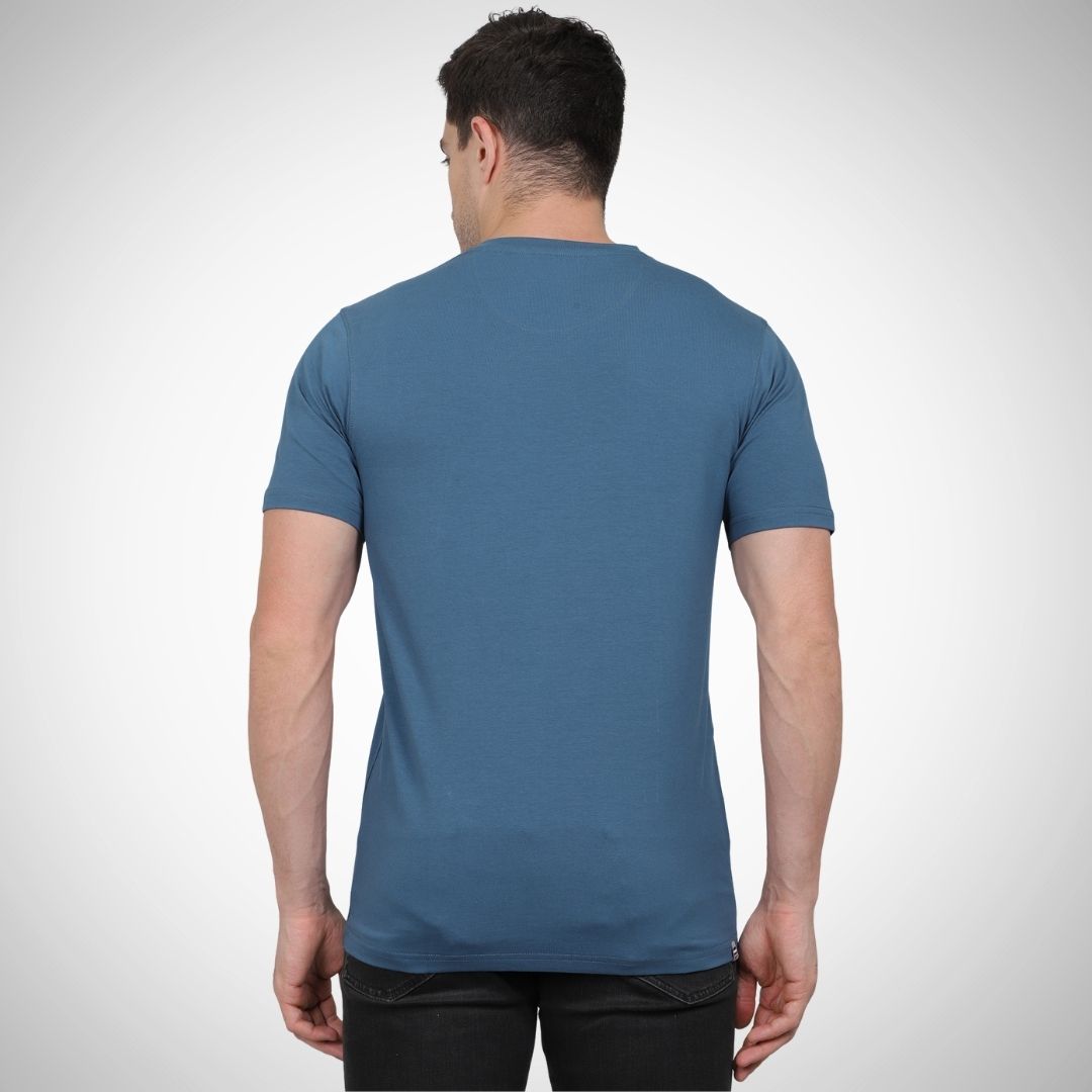 Man wearing a blue t-shirt on a white background